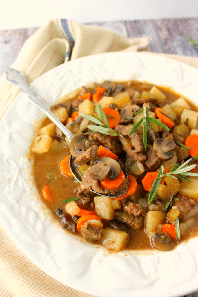 This easy slow cooker beef stew recipe is a delicious dinner option for any night of the week. Made with tender, delicious sirloin, along with big chunks of carrots, celery, potatoes and mushrooms its the ultimate comfort food!