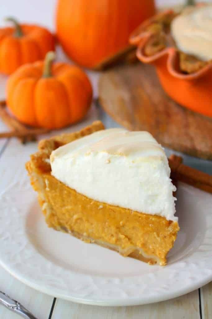 A delicious twist on the classic pumpkin pie, this his wonderfully easy pumpkin pie recipe is topped with a silky, delicious meringue.  Easy enough to make for a simple holiday meal, and fancy enough for a formal dinner, this Pumpkin Meringue Pie is the ultimate Thanksgiving dessert!