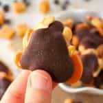 Salty and sweet come together for the most amazing gooey treat! These Chocolate Caramel Cashew Clusters are simply made with just four ingredients, making them the perfect Christmas candy! Fantastic for gifting, cookie exchanges, holiday parties or anytime you need to satisfy your sweet tooth!