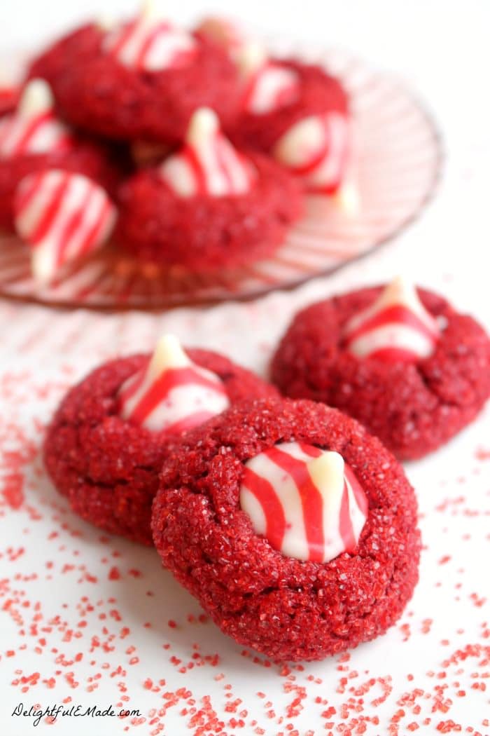 With a pretty sparkle and topped with a candy cane kiss, these fabulous red velvet cookies will be the star of your holiday events.  Perfect for holiday parties, cookie swaps, and even gifts for friends and neighbors. 