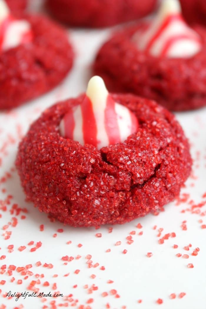 With a pretty sparkle and topped with a candy cane kiss, these fabulous red velvet cookies will be the star of your holiday events.  Perfect for holiday parties, cookie swaps, and even gifts for friends and neighbors. 