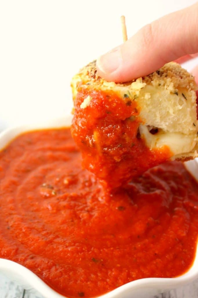 Football food doesn't get much better than this! Like a mini version of a meatball sub, these amazing Parmesan & Mozzarella Meatball Sliders are the perfect party food! Super-simple to make, this easy slider recipe is great for serving at your next watch party and also makes for a great pot-luck dish.