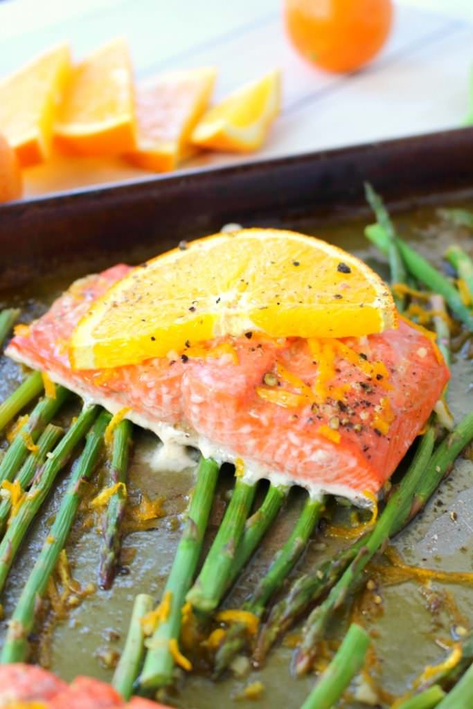 A wonderfully healthy, easy and delicious salmon recipe! Amazing flavors of oranges, lemon and lime glaze these salmon fillets, and when roasted with asparagus spears, it quickly becomes a super flavorful one pan meal. Healthy dinner ideas don't get much easier or delicious than this!