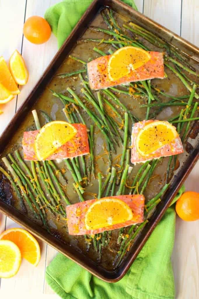 A wonderfully healthy, easy and delicious salmon recipe! Amazing flavors of oranges, lemon and lime glaze these salmon fillets, and when roasted with asparagus spears, it quickly becomes a super flavorful one pan meal. Healthy dinner ideas don't get much easier or delicious than this!