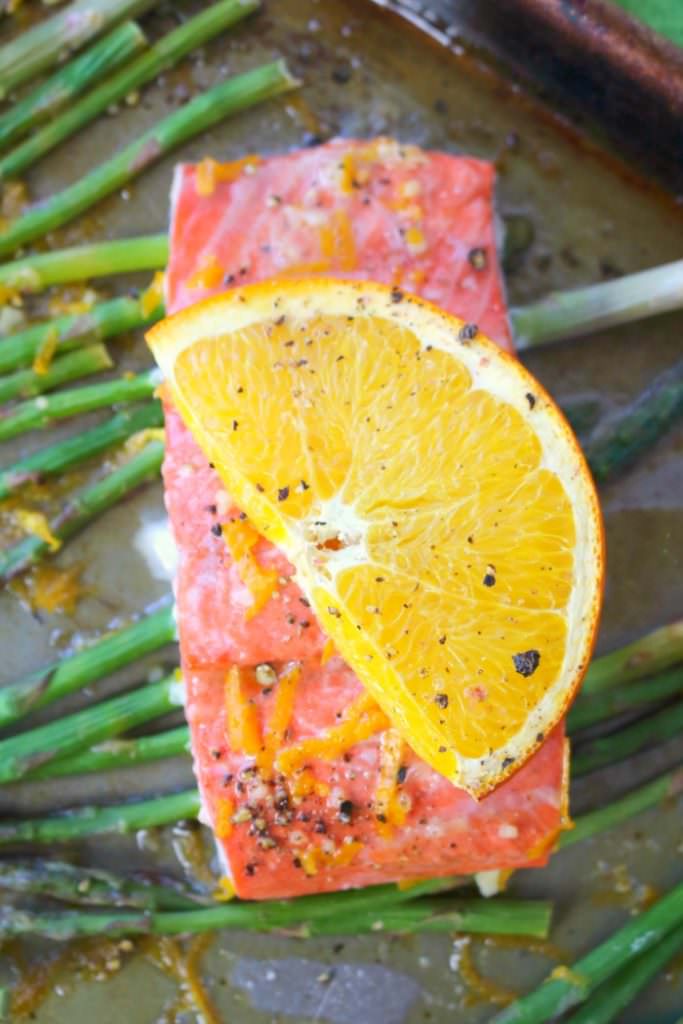 A wonderfully healthy, easy and delicious salmon recipe! Amazing flavors of oranges, lemon and lime glaze these salmon fillets, and when roasted with asparagus spears, it quickly becomes a super flavorful one pan meal. Healthy dinner ideas don't get much easier or delicious than this!