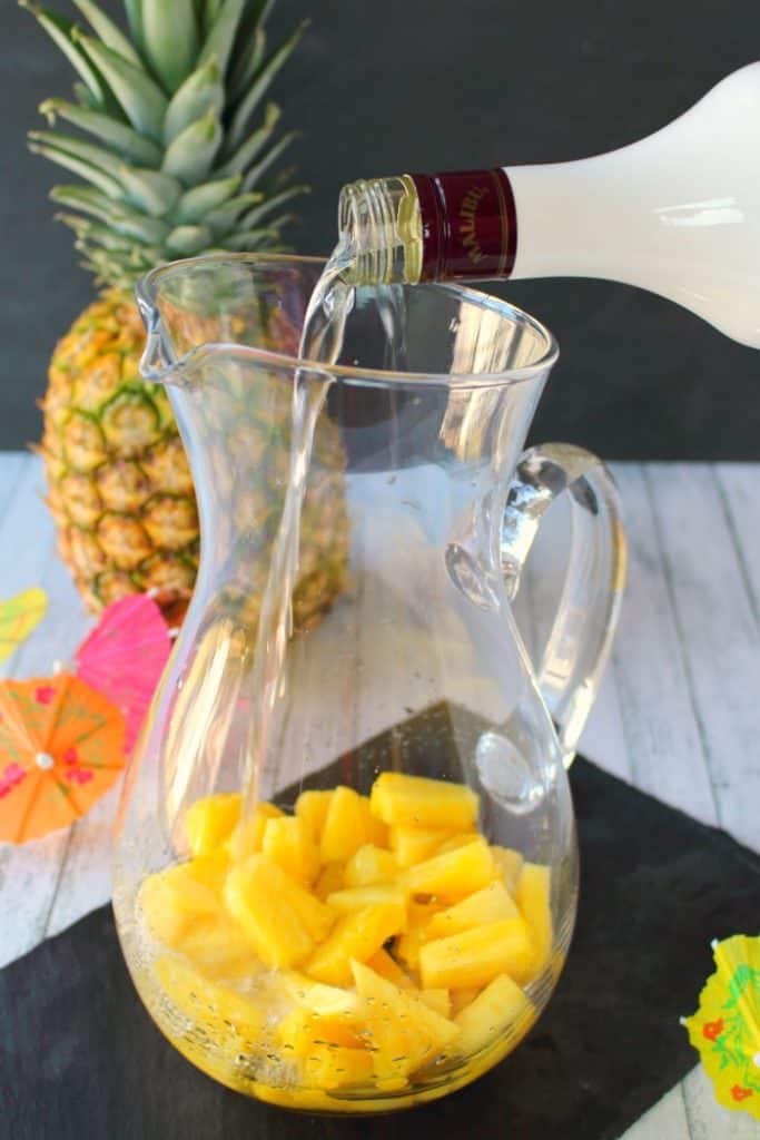 This Pina Colada recipe will be your new favorite happy hour drink! Made with four simple ingredients, this fantastic champagne punch is perfect for parties, showers, and girls nights! Forget the blender, this amazing pineapple coconut cocktail is super easy and completely delicious!