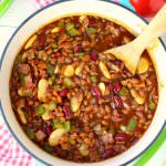The classic baked beans recipe got an awesome upgrade! These Bacon Lovers Baked Beans and loaded with 1 pound of crisp, delicious bacon along with three types of beans, peppers onions and an amazing sauce. Made in the oven or slow cooker, this easy side dish is a must-have for any cookout, pot-luck, tailgate party or picnic!