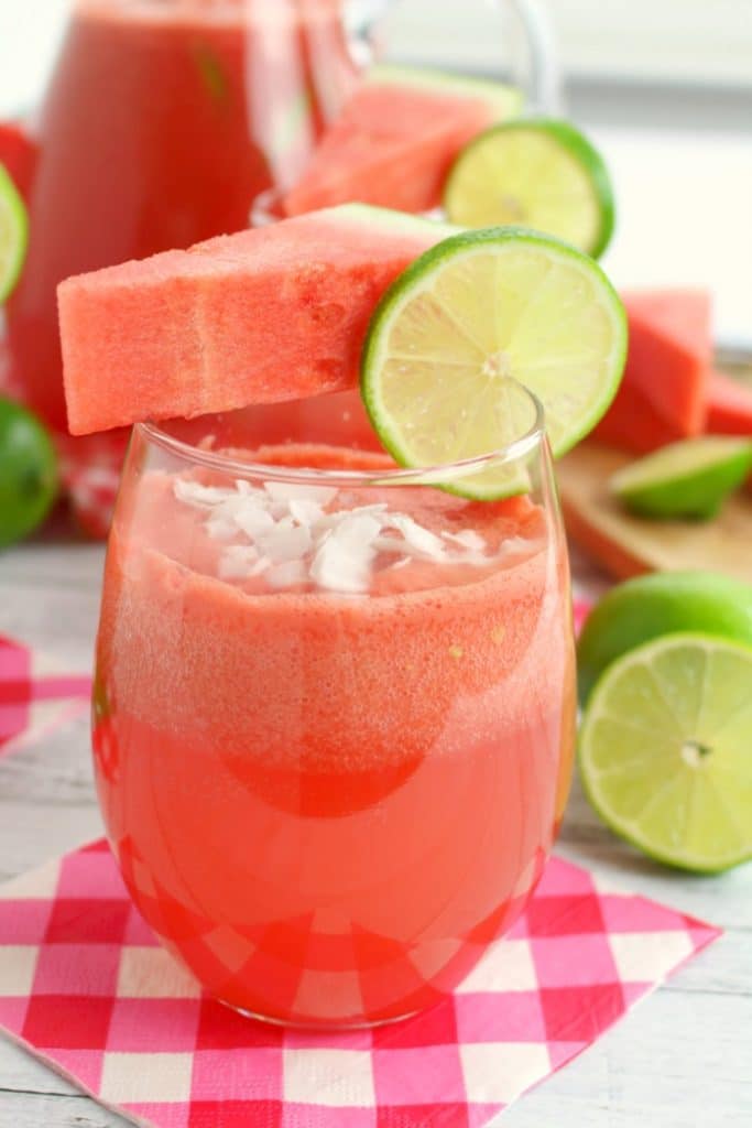 This amazing coconut rum punch is the quintessential summer cocktail! Made with fresh watermelon and coconut rum, this simple rum punch recipe comes together in moments. Perfect for sipping poolside or serving at your next summer soiree!