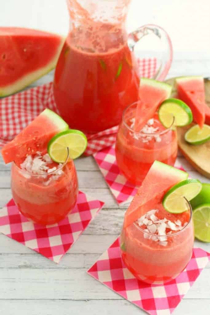 This amazing coconut rum punch is the quintessential summer cocktail! Made with fresh watermelon and coconut rum, this simple rum punch recipe comes together in moments. Perfect for sipping poolside or serving at your next summer soiree!