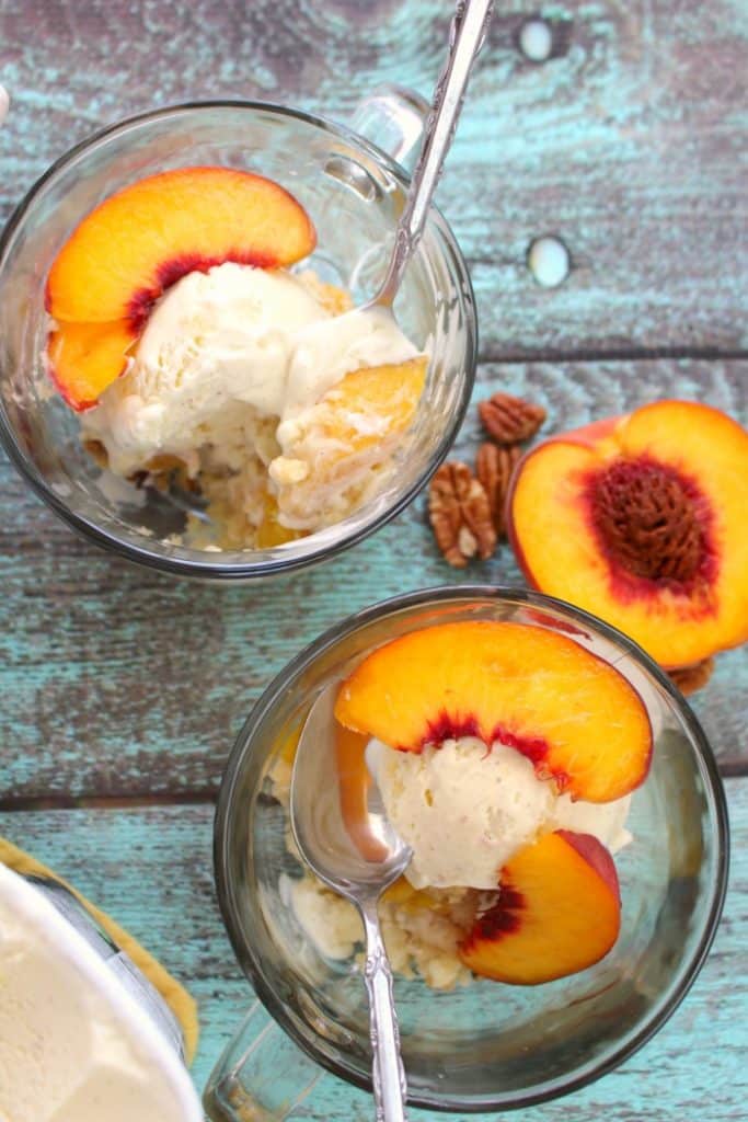 Just 4 ingredients is all you need to make this fantastic Cake Mix Peach Cobbler! Made in less time it takes to preheat the oven, this fantastic peach dessert is perfect anytime you're in the mood for old fashioned cobbler!