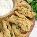 Do your kids eat chicken tenders like they're going out of style? Then these baked Parmesan Ranch Chicken Tenders are definitely for you! Baked with a Parmesan ranch coating, these chicken tenders are easy to make and come out of the oven crispy and loaded with flavor!