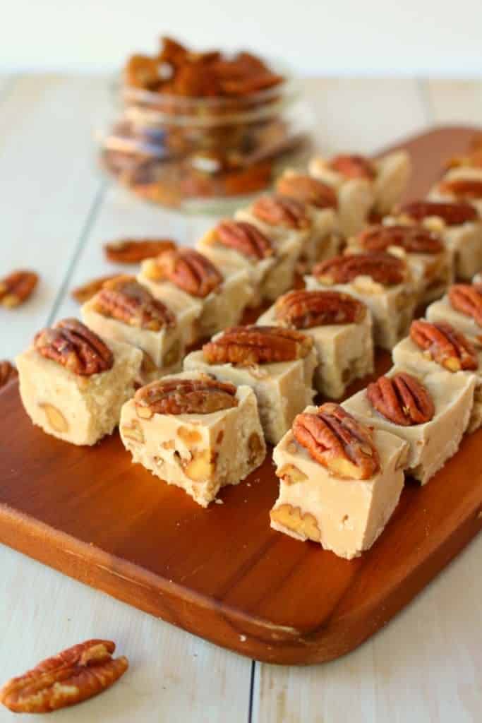 Are you a fudge lover? This delicious 5-ingredient Maple Pecan Fudge recipe will be right up your alley! Loaded with rich maple flavor and tender, brown sugar pecans, this maple fudge recipe is perfect for holiday candy making!
