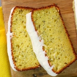 A seriously amazing lemon cake recipe! Much like lemon poppy seed muffins and quick bread, this super moist Lemon Poppy Seed Pound Cake is loaded with delicious lemon flavor. Topped with a wonderfully creamy lemon icing, this pound cake recipe is a keeper!