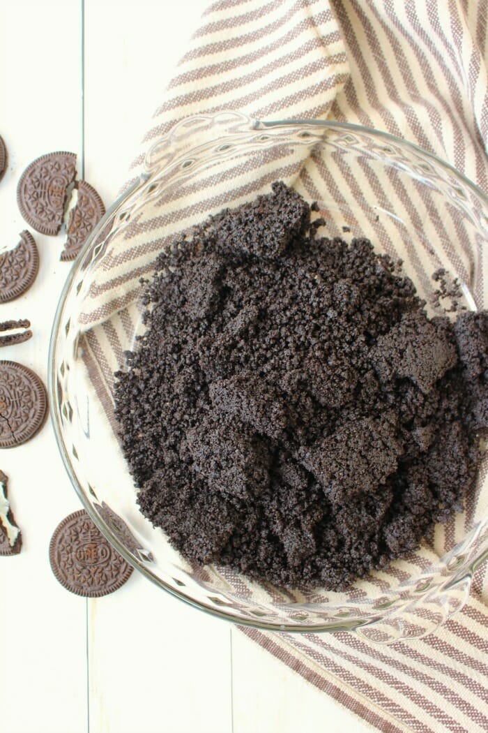 Oreo cookie crust crumbs in pie plate