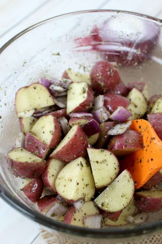 The perfect side dish for just about any meal! These Garlic & Herb Roasted Red Potatoes come together quickly and easily with simple herbs and seasoning that you likely already have in your pantry. Roasted in the oven for the perfect crispy perfection.