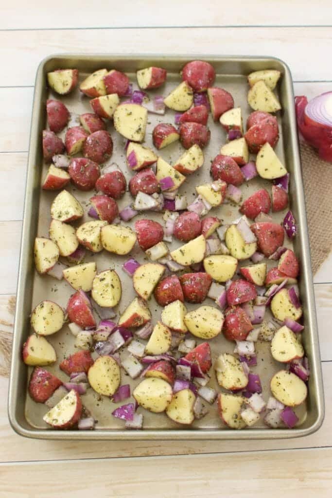 The perfect side dish for just about any meal! These Garlic & Herb Roasted Red Potatoes come together quickly and easily with simple herbs and seasoning that you likely already have in your pantry. Roasted in the oven for the perfect crispy perfection.