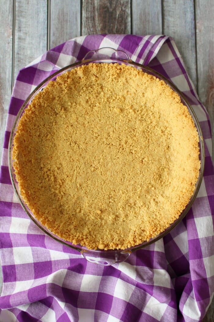 Golden oreo crust pressed together for pie crust.