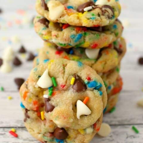 The ultimate chocolate chip cookie recipe! These Funfetti Chocolate Chip Cookies are loaded with sprinkles, white and semi-sweet chocolate chips, and packed with some serious flavor. Perfectly chewy, these cookies will be your new go to cookie recipe!