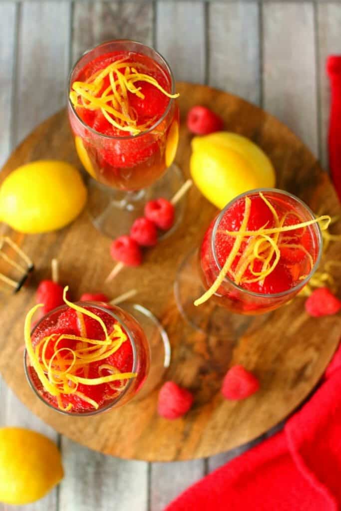 Mimosas brought to a whole new, glorious level! These Lemon Raspberry Mimosas are made with fresh raspberries, lemoncello liqueur, and topped off with a Champagne Rosé. Your brunch just got even more fabulous!
