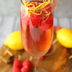 Mimosas brought to a whole new, glorious level! These Lemon Raspberry Mimosas are made with fresh raspberries, lemoncello liqueur, and topped off with a Champagne Rosé. Your brunch just got even more fabulous!