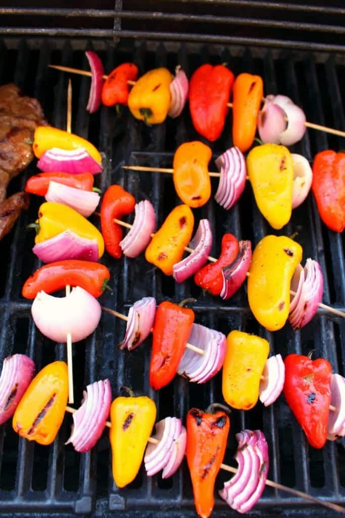 Get restaurant quality fajitas right at home! These savory Grilled Steak Fajitas will be your new favorite Tex-Mex meal. Made with tender, juicy flank steak and grilled with peppers and onions, this fajita recipe is simple to make and completely delicious!