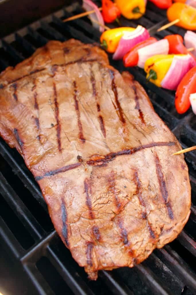 Get restaurant quality fajitas right at home! These savory Grilled Steak Fajitas will be your new favorite Tex-Mex meal. Made with tender, juicy flank steak and grilled with peppers and onions, this fajita recipe is simple to make and completely delicious!