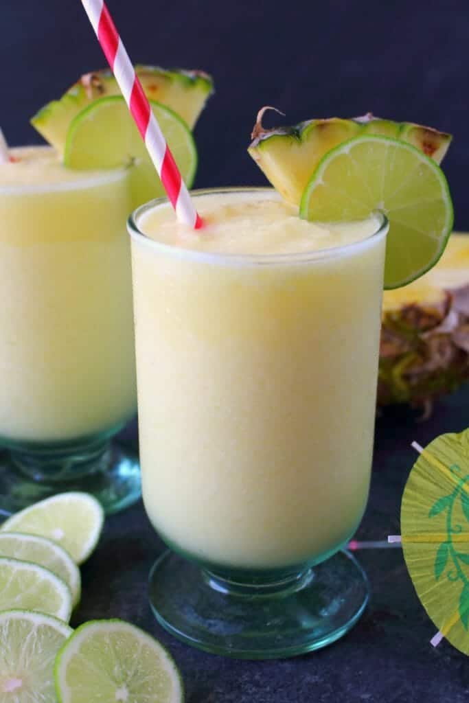 Meet your new favorite summer cocktail! This incredible Pineapple Daiquiri recipe is made with fresh pineapple, limes and coconut rum. Perfect for sipping poolside or blending for all of your friends at your next summer cookout!