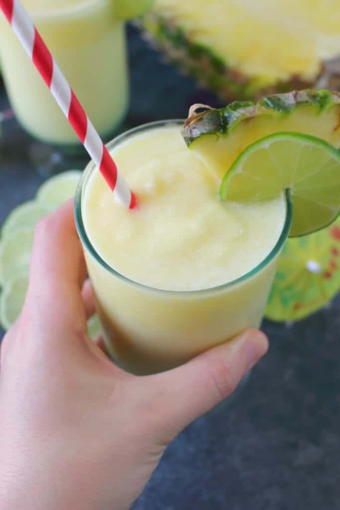 Meet your new favorite summer cocktail! This incredible Pineapple Daiquiri recipe is made with fresh pineapple, limes and coconut rum. Perfect for sipping poolside or blending for all of your friends at your next summer cookout!