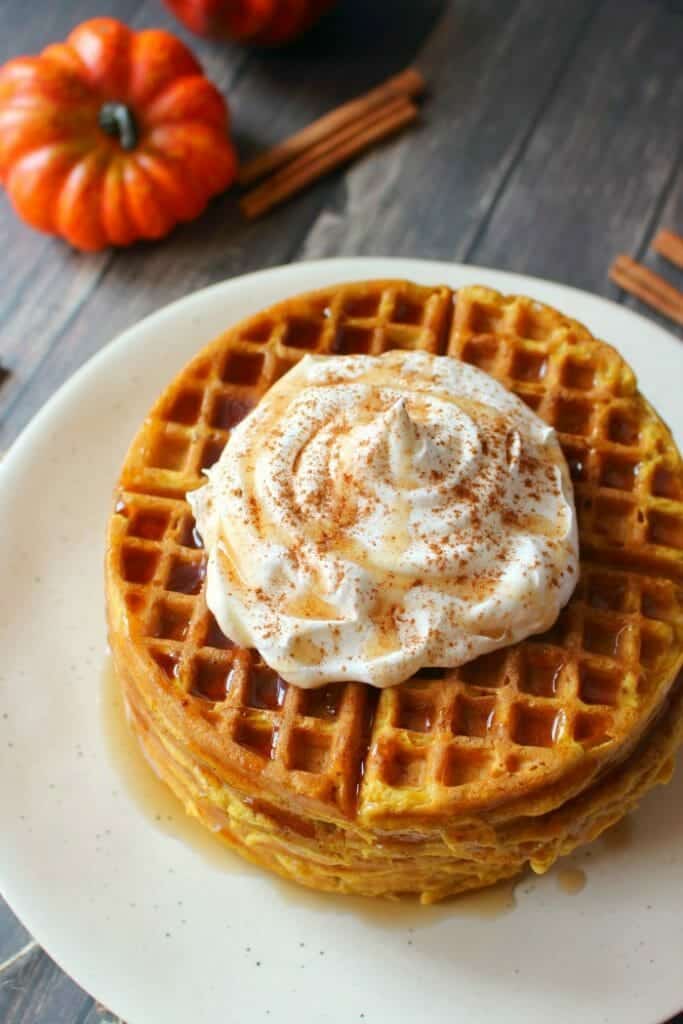 The ultimate fall breakfast! These Pumpkin Spice Waffles are great for a weekend brunch, and even better for freezing and toasting for an easy weekday breakfast. Made with simple ingredients, these delicious pumpkin waffles will be a new family favorite!