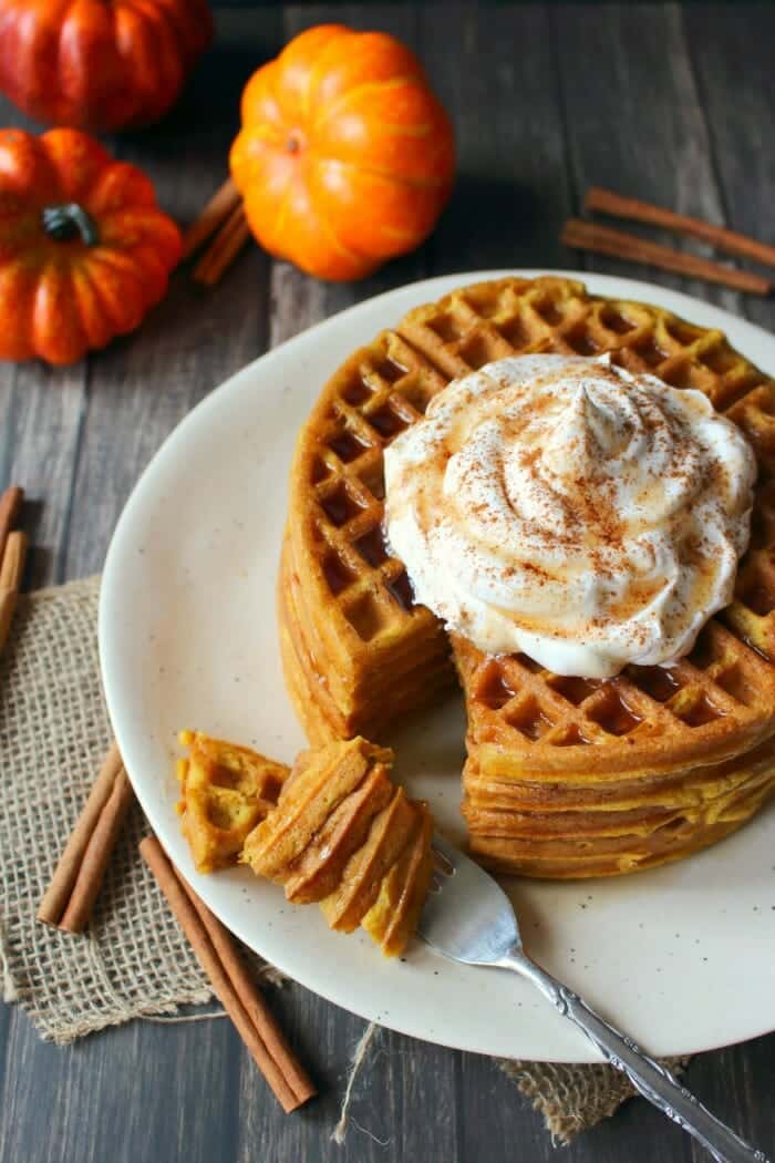 The ultimate fall breakfast! These Pumpkin Spice Waffles are great for a weekend brunch, and even better for freezing and toasting for an easy weekday breakfast. Made with simple ingredients, these delicious pumpkin waffles will be a new family favorite!
