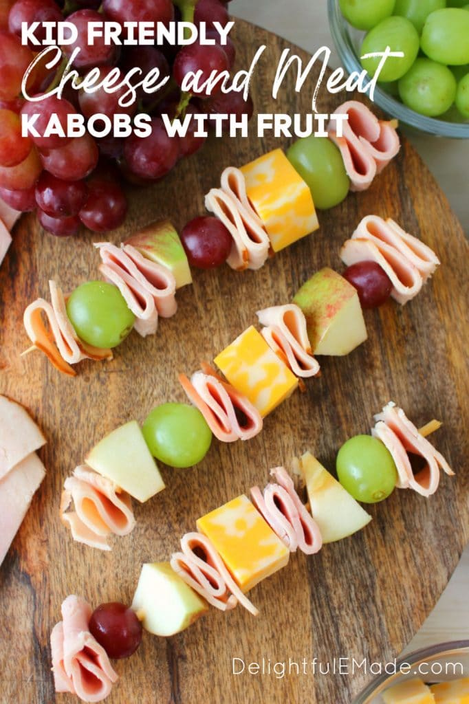 Looking for school lunch ideas? These fun and easy cheese and meat kabobs with fruit will have your kids excited to pack their lunchbox! These meat and cheese skewers are loaded with sliced turkey, ham, fruit and cheese. Great for the kid that won't eat a sandwich!