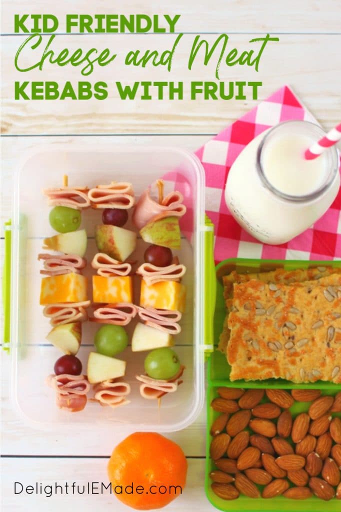 Looking for school lunch ideas? These fun and easy cheese and meat kabobs with fruit will have your kids excited to pack their lunchbox! These meat and cheese skewers are loaded with sliced turkey, ham, fruit and cheese. Great for the kid that won't eat a sandwich!