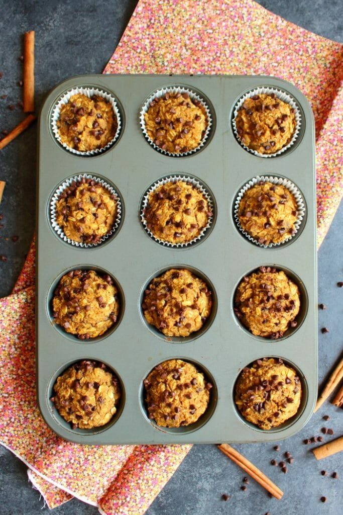 The perfect healthy muffin recipe that happens to taste amazing! These delicious Pumpkin Chocolate Chip Protein Muffins are loaded with protein and fiber, making them a great choice as a quick breakfast or healthy snack.