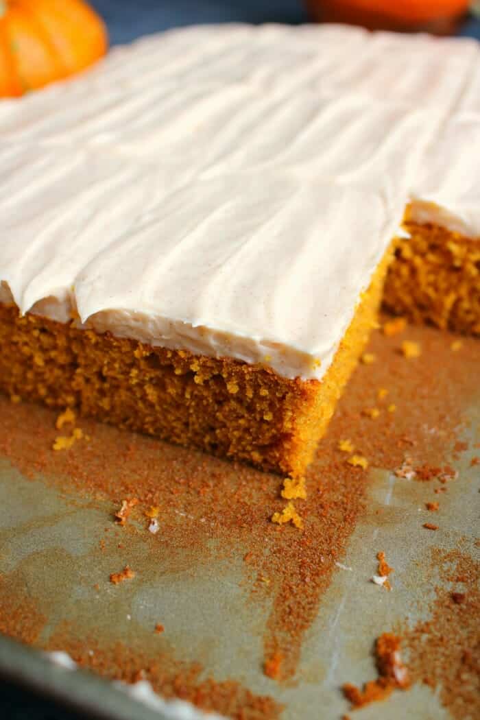 The perfect fall dessert! These Pumpkin Bars with Cinnamon Cream Cheese Frosting are like pumpkin sheet cake, but frosted with a thick, delicious layer of cream cheese frosting. Other dessert bars will be completely jealous of these showstoppers!