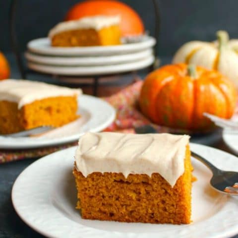 The perfect fall dessert! These Pumpkin Bars with Cinnamon Cream Cheese Frosting are like pumpkin sheet cake, but frosted with a thick, delicious layer of cream cheese frosting. Other dessert bars will be completely jealous of these showstoppers!