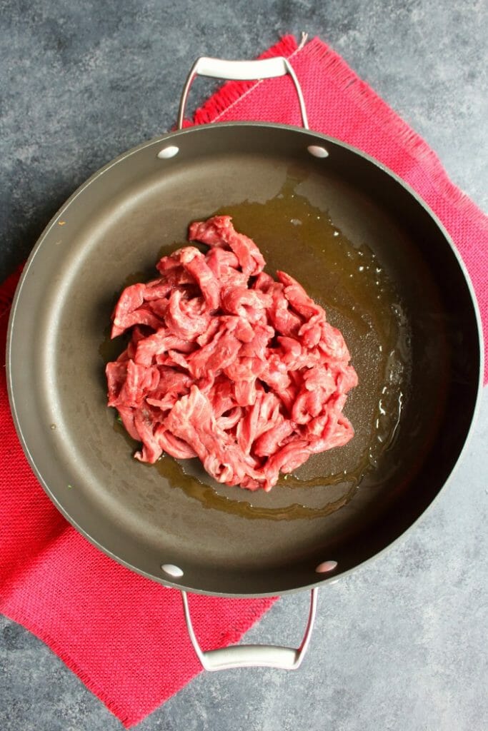 Your new go-to healthy dinner idea! This delicious Low-Carb Vegetable Beef Stir Fry is loaded with flavor and packed with protein. Made with sirloin beef, and lots of fresh vegetables, this 20-minute dinner will be a new family fave!