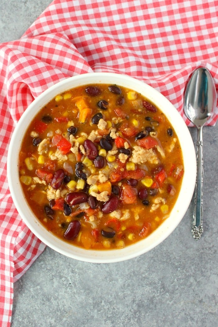 The most flavorful, delicious Healthy Turkey Chili Recipe out there! Made with lean ground turkey, bell peppers, beans and a few other ingredients, this is definitely the best Turkey Chili Recipe I've ever made!