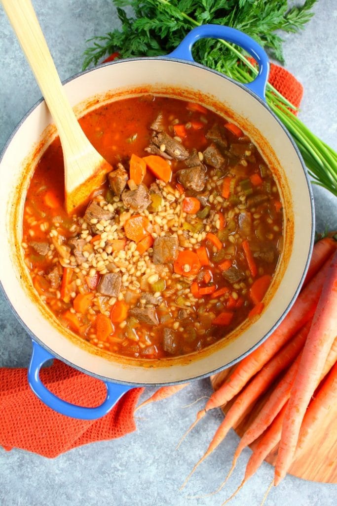 This Vegetable Beef and Barley Soup recipe will be your new favorite way to warm up in the winter! Loaded with fresh veggies, this delicious beef and barley soup is easy to make and completely delicious!