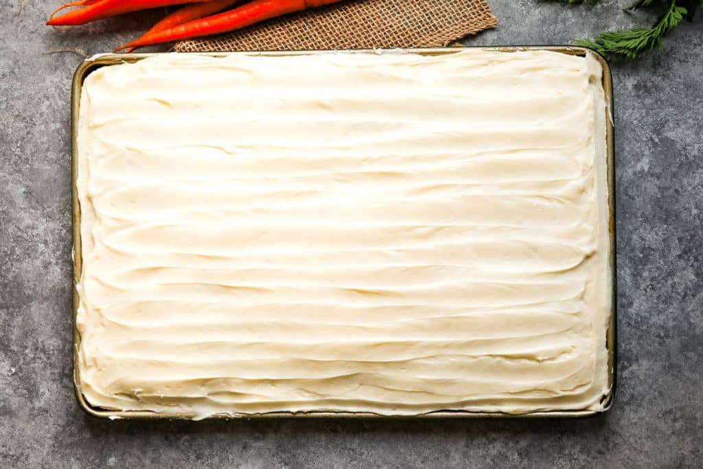 Carrot cake sheet cake frosted with cream cheese frosting.