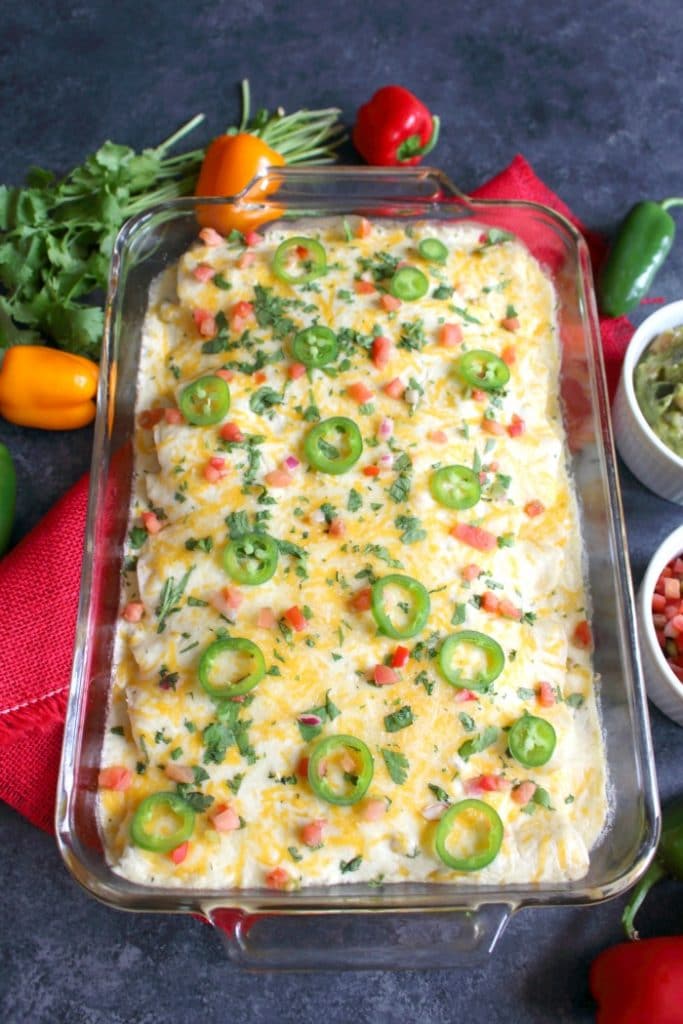 Need an amazing Shredded Chicken Enchilada recipe? Look no further! My Sour Cream Check Enchilada recipe is a fantastic dinner idea, and perfect for when you're craving Tex-Mex!