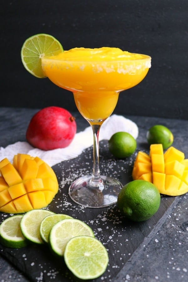 If you love a great margarita, then my Mango Margarita recipe is a must! Made with fresh mangoes, lime juice, tequila and Cointreau, this skinny margarita recipe is simple to make and completely delicious!
