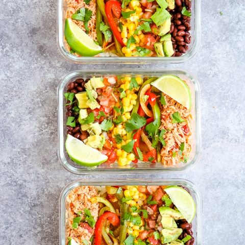 If you love Chipotle burrito bowls, but not all the calories, check out this delicious Chicken Burrito Bowl Recipe! Made with all your Chipotle faves, this Burrito Bowl Meal Prep is made with cauliflower rice, veggies, black beans and my simple slow cooker chicken. This burrito bowl recipe is perfect for your Meal Prep Sunday!
