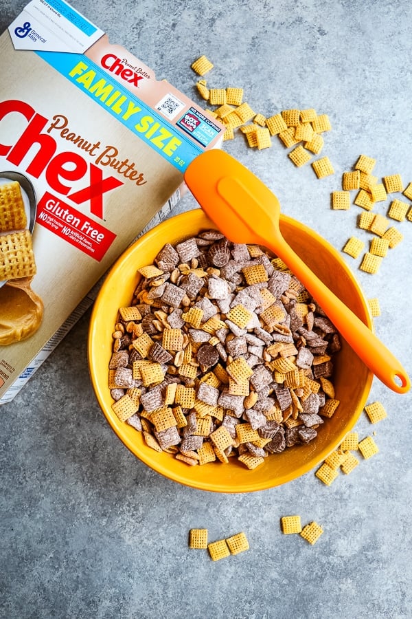 With summer in full swing, I’ve got the perfect sweet chex mix recipe to take along! This delicious Loaded Peanut Butter Chex Party Mix is made with chex mix muddy buddies and is the perfect treat to take to the pool, along for bike rides and at the basketball court.