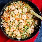 Once you try my Cauliflower Fried Rice Recipe you'll never buy take-out again! This Cauliflower Shrimp Fried Rice has all the great flavors and textures of your favorite take-out place, without all of the carbs & calories. The perfect healthy shrimp fried rice!