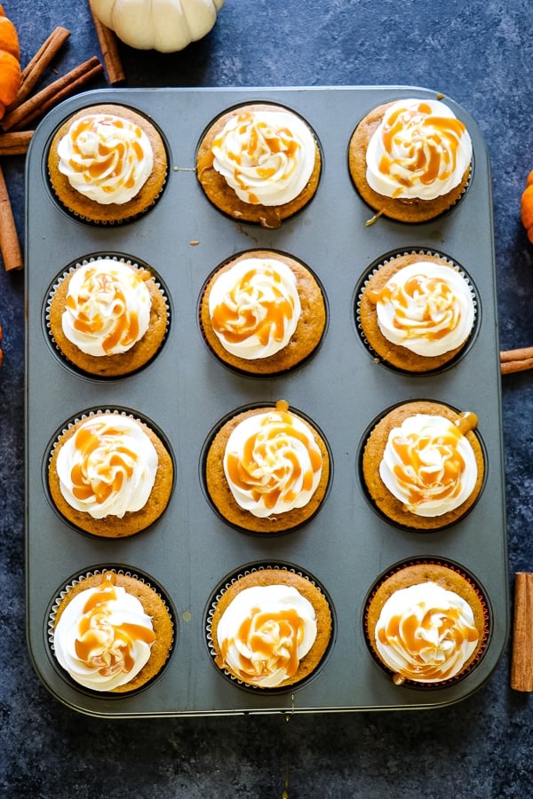 If pumpkin is your thing then these Caramel Pumpkin Spice Cupcakes with Cream Cheese Frosting and Filling will be your new favorite way to indulge! Modeled after my uber popular Pumpkin Caramel Cream Cheese Poke Cake, these cupcakes are loaded with flavor and deliciousness!