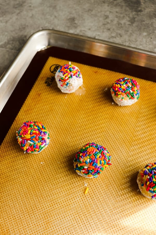 If you love an easy cookie recipe, these Funfetti Cake Mix Cookies are for you! Made with just a few simple ingredients, these cream cheese cake mix cookies are fantastic with rainbow sprinkles or Christmas sprinkles. Fantastic for just about any celebration!