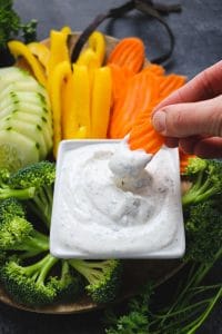 Need a healthy snack option? This simple, 5-ingredient Greek Yogurt Veggie Dip is the perfect way to enjoy fresh veggies. Enjoy with veggies, spread on a sandwich or topping a salad, this Greek Yogurt Ranch Dip is a great alternative to a dip mix!