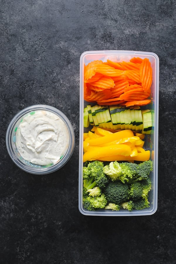 Need a healthy snack option? This simple, 5-ingredient Greek Yogurt Veggie Dip is the perfect way to enjoy fresh veggies. Enjoy with veggies, spread on a sandwich or topping a salad, this Greek Yogurt Ranch Dip is a great alternative to a dip mix!