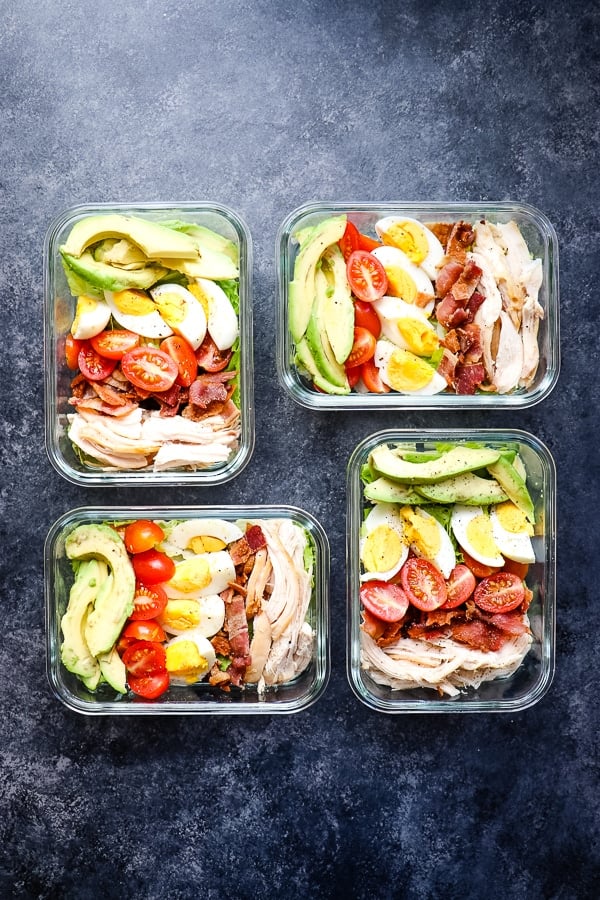 This healthy chicken cobb salad recipe is nothing short of incredible! With traditional cobb salad ingredients, this healthy version leaves out unhealthy oils and over-sugared dressings, but keeps all of the delicious flavors. I'll show you how to make cobb salad for meal prep, too!
