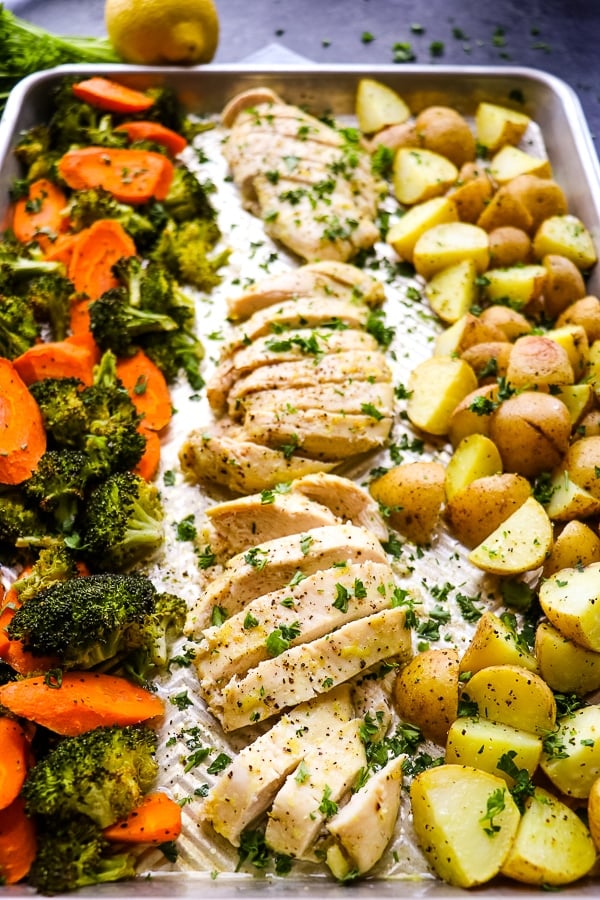 Looking for a one pan chicken and potatoes recipe? This simple, healthy Sheet Pan Chicken and Potatoes will be your new go-to chicken breast recipe! Made all on ONE sheet pan, and paired with vegetables this quick dinner idea is perfect for any night of the week.